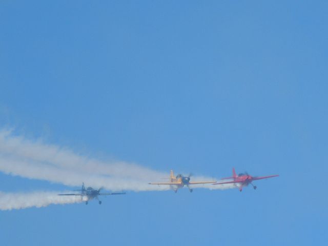 EXTRA EA-300 (N580GP) - Matt Chapman flying in formation in his Eagle 580 at Thunder in the Desert 2014.