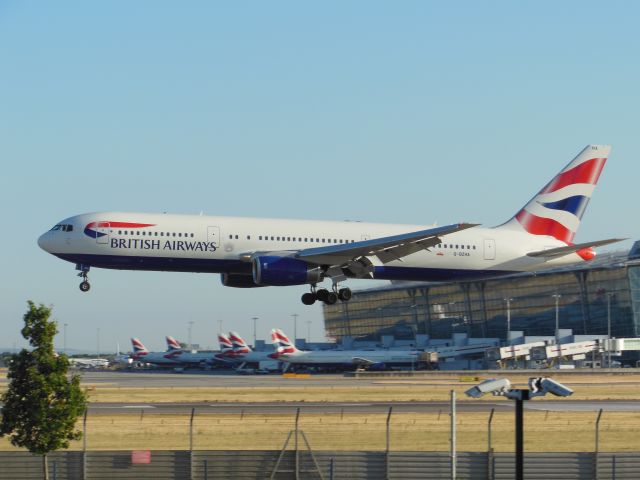 BOEING 767-300 (G-BZHA) - British Airways (BA) G-BZHA Boeing 767-336 ER [cn29230]br /London Heathrow (LHR). British Airways flight BA677 arriving from Istanbul Atatürk (AST).  br /Taken from Viewing Area, T5 Thistle Hotel Bar, Bath Road (adjacent to runway 9L)br /2013 07 19 a rel=nofollow href=http://alphayankee.smugmug.com/Airlines-and-Airliners-Portfolio/Airlines/EuropeanAirlines/British-Airways-BA/https://alphayankee.smugmug.com/Airlines-and-Airliners-Portfolio/Airlines/EuropeanAirlines/British-Airways-BA//a