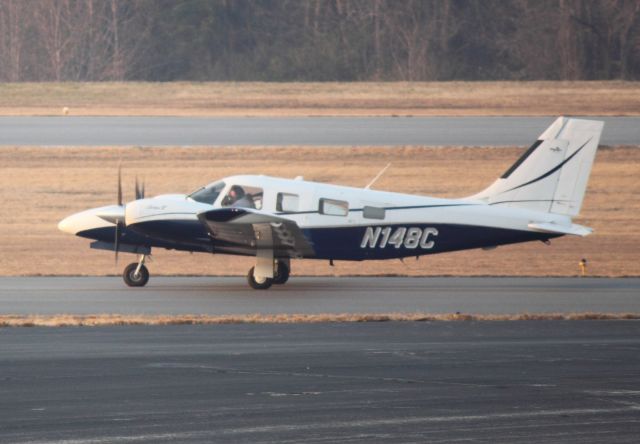 Piper Seneca (N148C) - Taxiing to 8 at FTY on 02/15/2011