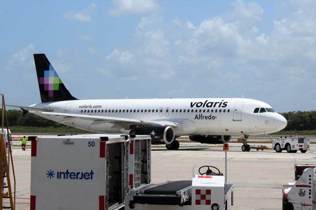 Airbus A320 (N514VL) - Volaris (Y4) N514VL A320-233 [cn5337]br /Cancun (CUN). Volaris flight Y4714 departing for Mexico City (MEX). br /Taken from Terminal 2br /2017 08 11   a rel=nofollow href=http://alphayankee.smugmug.com/Airlines-and-Airliners-Portfolio/Airlines/AmericasAirlines/Volaris-Y4https://alphayankee.smugmug.com/Airlines-and-Airliners-Portfolio/Airlines/AmericasAirlines/Volaris-Y4/a