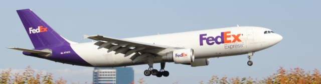 Airbus A300F4-600 (N741FD) - A FedEx flight lands at KSNA from its flight to Memphis.