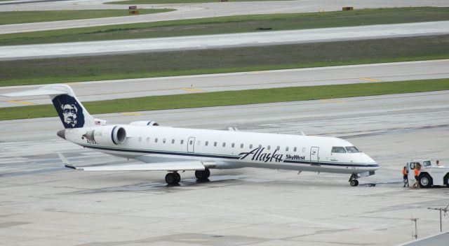 Canadair Regional Jet CRJ-700 (N216AG) - 081014 on pushback for e daily KSEA flight