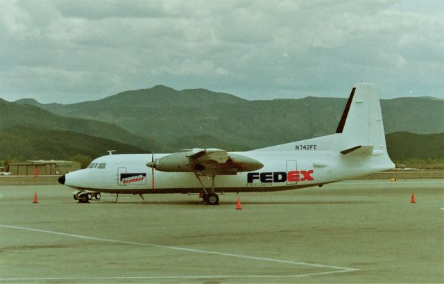 Cessna Caravan (N742FE) - KRNO - (FA type a/c is not this F-27 ) early to mid 1990s on one of our many trips to Carson City - a stop at Reno was on the way so I'd cruise the airport open access roads around the airport. Then I spotted this Fokker F-27 on the FedEx Cargo area. I don't even remember which road I was on to get this snap. Online record show FedEx registered this plane about May 1992 and that confirms the date apprx 1992-1995. I knew it would not start up until later or the next day, so we headed on south to Carson City.