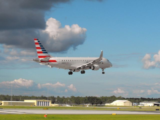 Embraer 170/175 (N447YX) - A Republic E175 over the numbers for RWY 9