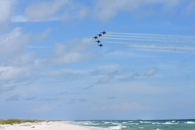 McDonnell Douglas FA-18 Hornet — - USN Blue Angles in a right bank before an overhead break at NAS Pensacola. Taken at Perdido Key, FL