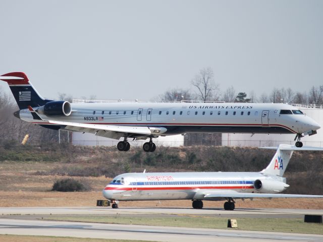 Canadair Regional Jet CRJ-900 (N933LR) - Approaching runway 18C - 3/11/09