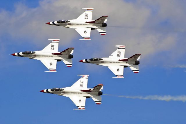 Lockheed F-16 Fighting Falcon — - The U.S. Thunderbirds do a diamond pass at Robins AFB.