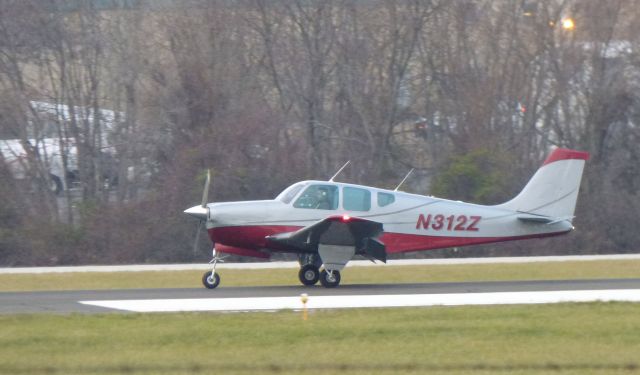 Beechcraft Bonanza (33) (N312Z) - Shown here is a 1960 Beechcraft Bonanza 35-33 Debonair a moment after landing in the Autumn of 2016.