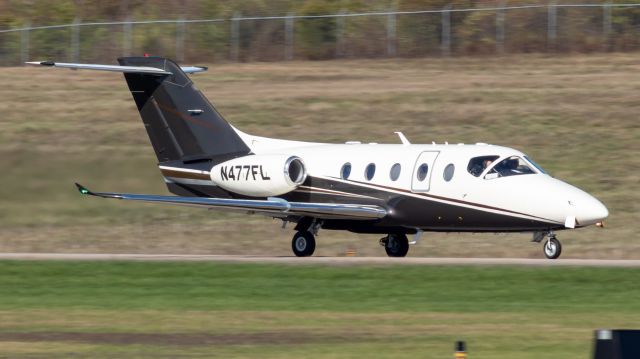 Beechcraft Beechjet (N477FL) - Flair Jet 814 rolling down runway 11 for flight to Teterboro.