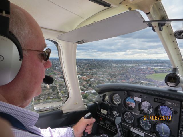 Piper Cherokee (VH-BZE) - Snap by happy passenger - arriving at Moorabbin airport Australia