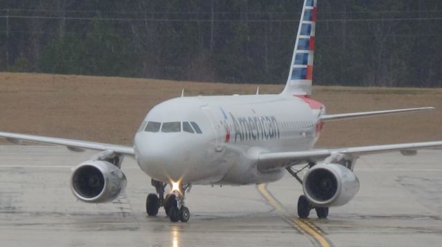 Airbus A319 (N808AW) - U.S Airways 1934 arriving from Charlotte at 3:10 P.M. on runway 5L.  Taken March 19, 2015.