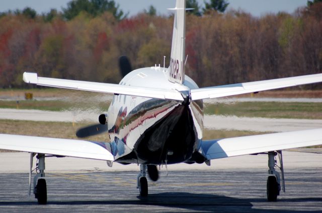 Socata TBM-850 (N302RJ) - F1 Airs newest toy on the airfield emitting some warm-looking exhaust on a chilly day (see N301RJ)