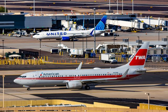 Boeing 737-800 (N915NN) - American Airlines 737-800 in TWA retro livery taxiing at PHX on 12/16/22. Taken with a Canon R7 and Tamron 70-200 G2 lens.