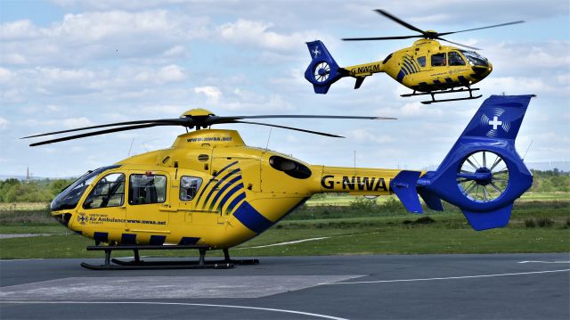 Airbus A319 (G-NWAE) - Helimed 72 departing Barton over Helimed 75