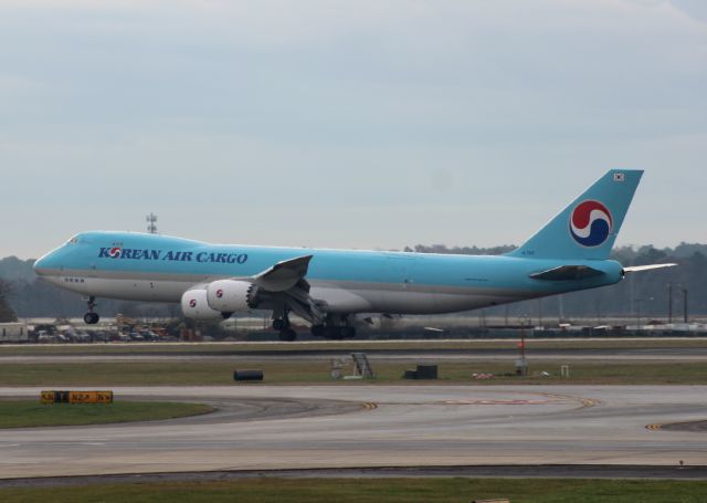 BOEING 747-8 (HL7610) - Not my best shot, but it was rushed. I got caught up in many planes just to see it from the corner of my eye. Lucky catch, huh!