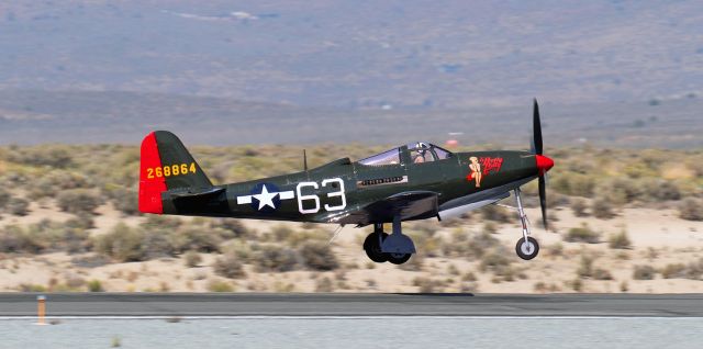 Bell Kingcobra (N163BP) - "Pretty Polly" (Race 63), a Bell P-63 Kingcobra (N163BP / NX163BP), former military reg 42-68864, goes airborne with Patrick Nightingale in the cockpit to participate in an Unlimited Class race during the 2021 Reno Air Races (aka: National Championship Air Races).