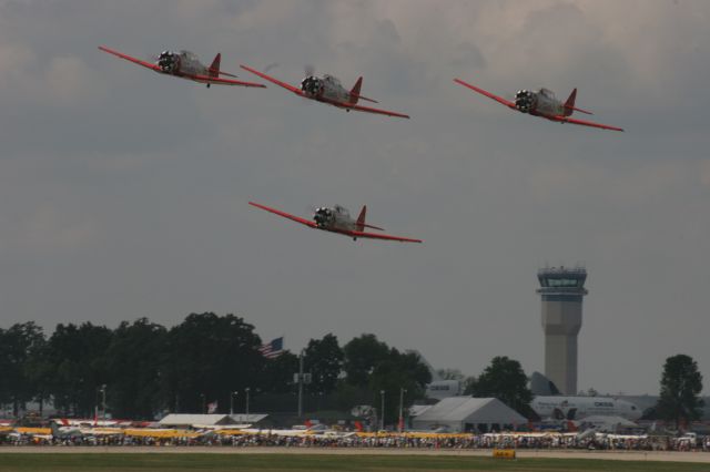 North American T-6 Texan — - T-6 Aeroshell Team at EAA Airventure Oshkosh 2012
