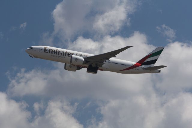 BOEING 777-300 (AG-EWG) - Emirates 777-300 departing DFW