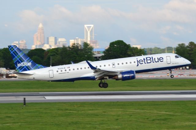 Embraer ERJ-190 (N328JB) - "Blue Warrior" arriving 18C at KCLT - 5/18/18