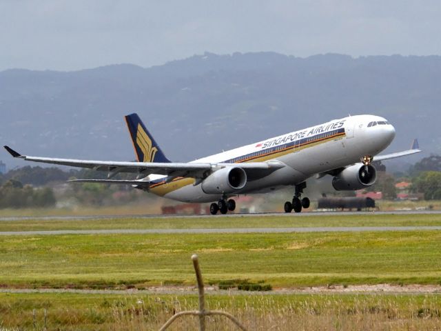Airbus A330-300 (9V-STI) - Getting airborne off runway 23 and heading home to Singapore. Friday 5th October 2012.