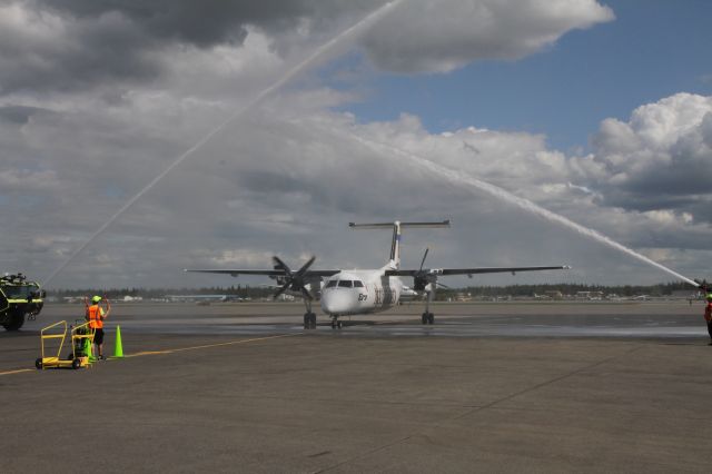 N887EA — - Unveiling of new "University aircraft" at Fairbanks airport One side UAF Nanooks, other side UAA Seawolves