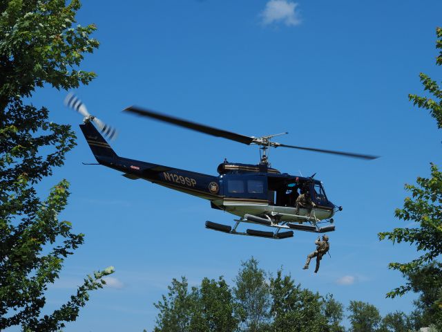 Bell UH-1V Iroquois (N129SP) - New York State Police Open House, Troop G, Latham NY right behind Albany Intl Airport. " SORT" demo. 8/6/23