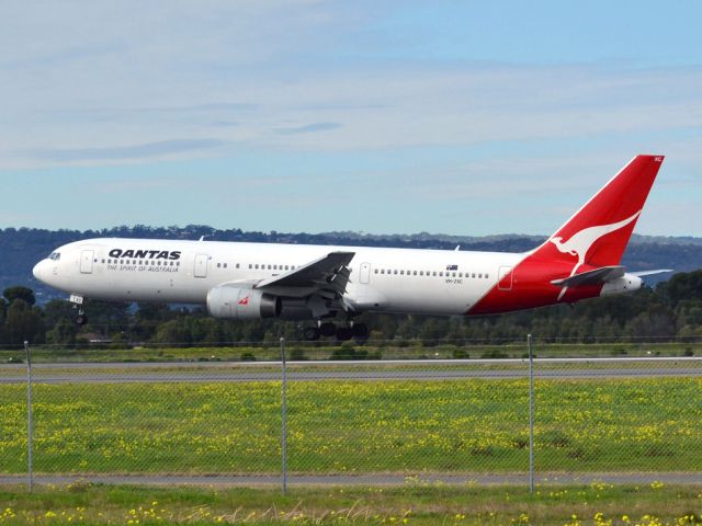 BOEING 767-300 (VH-ZXC) - About to put down on runway 05. Thursday 12th July 2012.