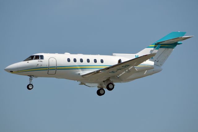 Hawker 800 (M-ALBA) - A 900XP arriving at the Hawker Beechcraft facility, June 2012.