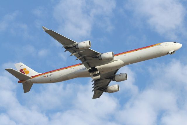 Airbus A340-600 (EC-JPU) - Departing runway 027L, LHR.