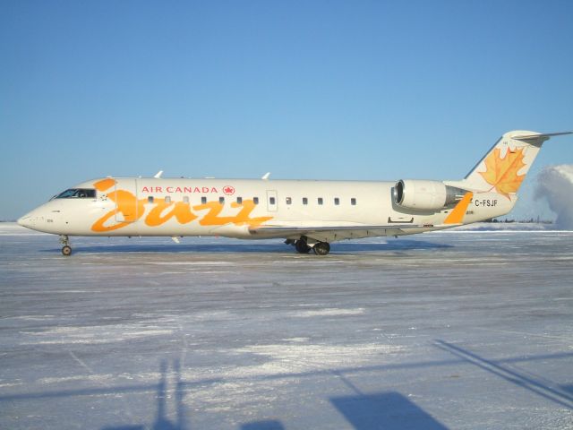 Canadair Regional Jet CRJ-200 (C-FSJF) - Departing the ramp at Goose Airport NL. Jan 18 /09