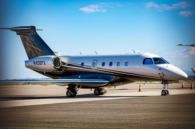 Embraer Legacy 450 (N406FX) - On the ramp at KBJC.