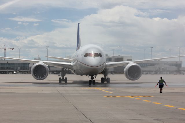 Boeing 787-8 (N20904) - Getting sprayed by DFD water cannons for the inaugural nonstop flight from Denver to Tokyo on 10June2013.