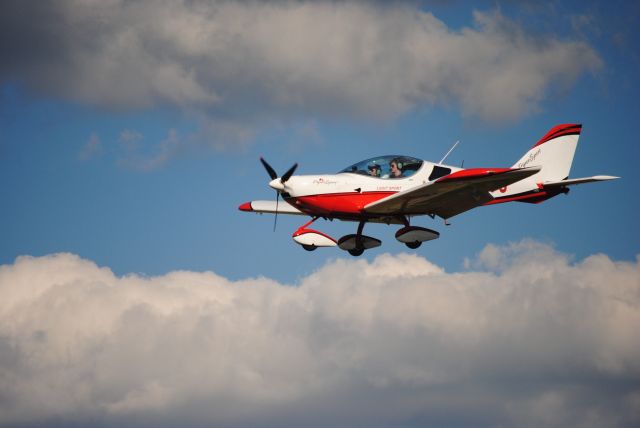 CSA SportCruiser (N610PS) - Watching my 15-year-old son on final from nearby buildings in 2012. He wanted flying lessons before driving lessons! 