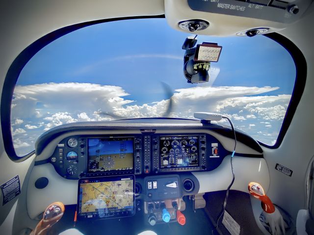 Cessna 400 (N63TE) - Lined up to fly between Thunder Heads.  It was smooth air flying between Heads.