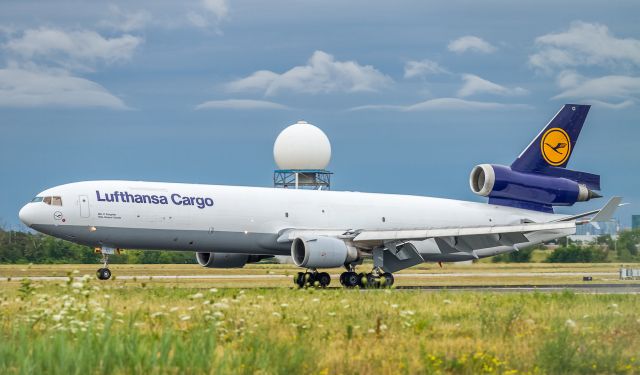 Boeing MD-11 (D-ALCI) - Lufthansa Cargo touches down on runway 05 after the voyage from Frankfurt as GEC8202. No more than two hours on the ground and off again to Dallas/Fort Worth. YYZ spotters very happy to see the Lufty MD11s!