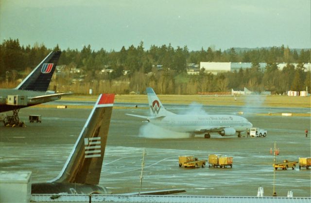 BOEING 737-300 (N3XXAW) - KSEA - copying Gman photo posts of his classic 757 smoky start up..here is my Seattle try in Jan 2000 - :)