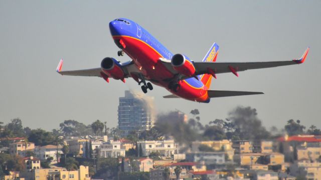 Boeing 737-700 — - Departing Runway 27 KSAN