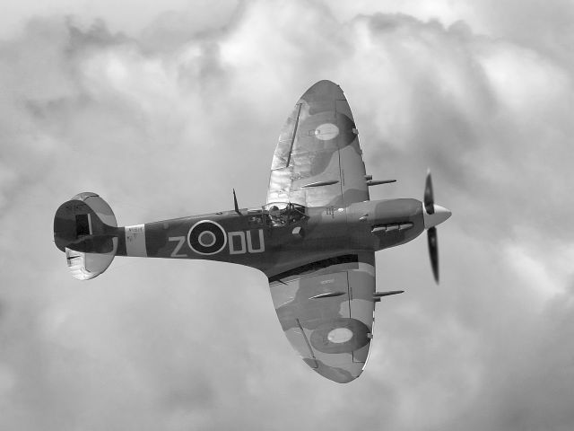 — — - FHCAMs Supermarine Spitfire MkVC over Paine Field, Everett,WA.