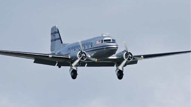 Douglas DC-3 (N877MG) - Historic Flight Foundations new DC3C on final approach to runway 16R on 2/27/13. (Ser#4193).