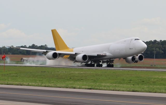 BOEING 747-8 (N856GT) - A Atlas Air Boeing 747-800 (Cathay Pacific 3124) arriving under overcast skies, Runway 36L, Carl T. Jones Field, Huntsville International Airport, AL, - June 6, 2017. 