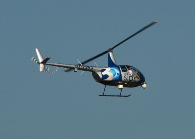 Robinson R-44 (N7094J) - Lifting off from Wilson Air Center at KCLT - 5/24/16