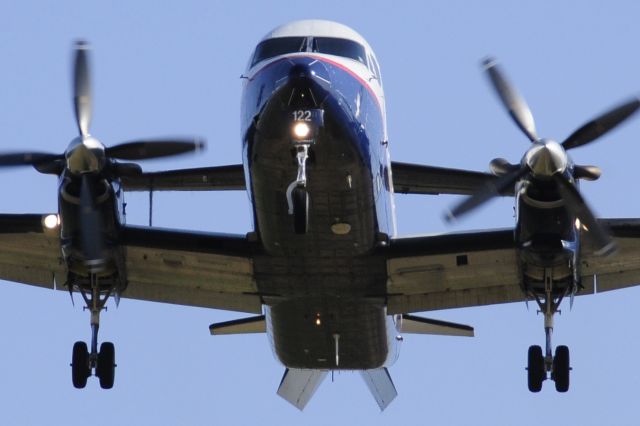 Beechcraft King Air 90 (N122UX) - Great Lakes Airlines Beechcraft 1900 landing at Merced Regional Airport