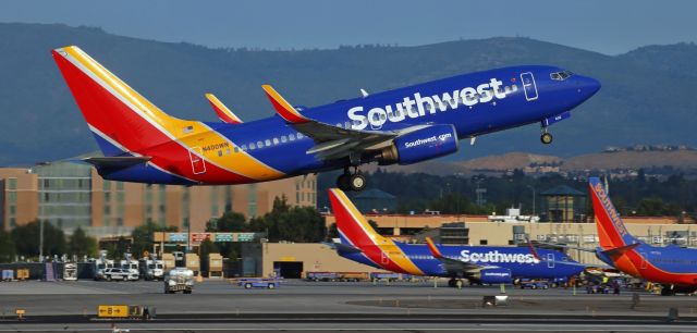 Boeing 737-700 (N400WN) - Off 34L and on the climb to begin a morning flight to San Diego (KRNO-KSAN).