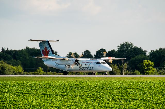 de Havilland Dash 8-100 (C-FGRP) - Air Canada Express, JZA8654, operated by Jazz Aviation LP prepares for take off on runway 33 at CYXU London, Ontario.