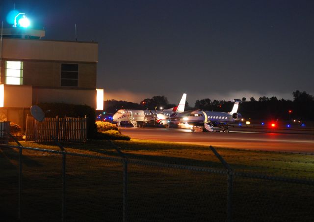 — — - Two of the NASCAR teams arriving back home after the race in Miami. From left to right: N517JG and N500PR - 11/21/10