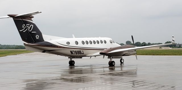 Beechcraft Super King Air 300 (N769BJ) - Rainy morning, flying off to be sold