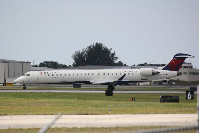 Canadair Regional Jet CRJ-900 (N920XJ) - Delta Flight 3493 operated by Endeavor Air (N920XJ) arrives at Sarasota-Bradenton International Airport following a flight from Laguardia Airport