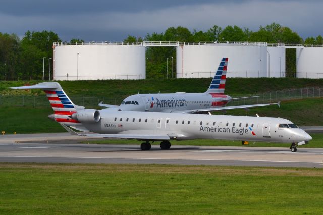 Canadair Regional Jet CRJ-900 (N586NN) - Takeoff roll runway 18C at KCLT - 4/13/19