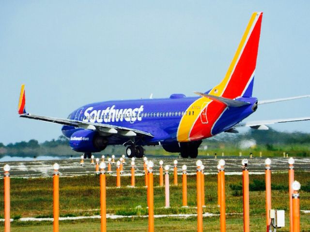 Boeing 737-700 (N7731A) - SOUTHWEST B737 TAXING TO THE RUNWAY 08 AT MDPC AIRPORT!