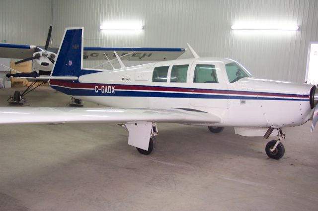 C-GADX — - MOONEY IN IS HANGUARD IN JOLIETTE